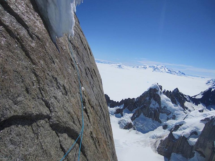 Colin rappels the last rock pitch of the Huber-Schnarf route, during his solo ascent of Torre Egger  © Colin Haley