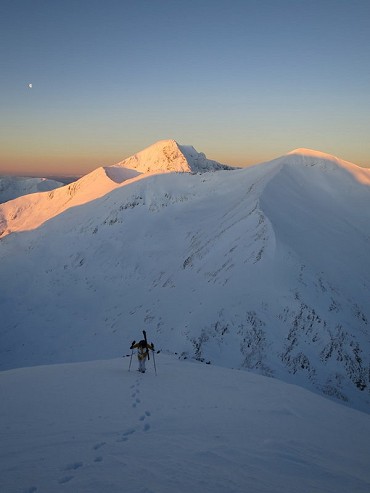 Approaching the Aonach Mor plateau with Ben Nevis and Carn Mor Dearg behind    © Finlay Wild