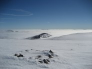 Looking east from the 1295 spot height on Ben Macdui. Sgorr an Lochain Uaine in the foreground, Beinn a' Bhuird beyond.
