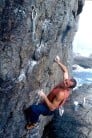 StuartM on the crux of Naughty Dragon, F8a, Tung Lung Island