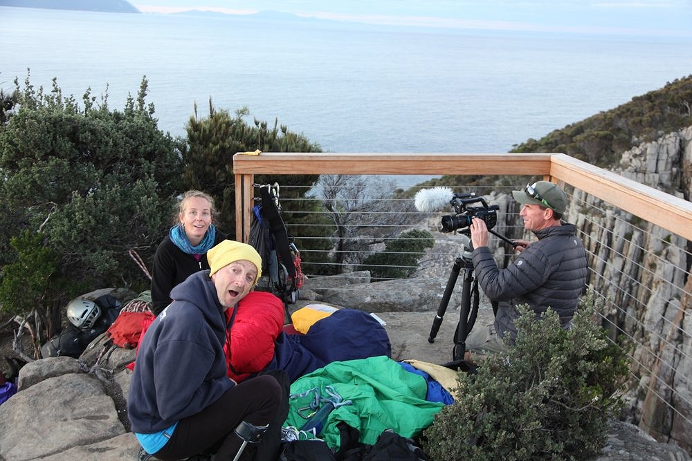 Pritchard, Melinda Oogjes and Matthew Newton on the edge of Cape Hauy.  © Vonner Keller