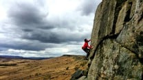 Mischa Hawker-Yates onsighting White Wand on a perfect Stanage day.