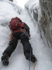 Jason Hubert setting out on the icy chimney, p3