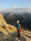 Walking down from cinque torri in dolomites as the sun sets.
