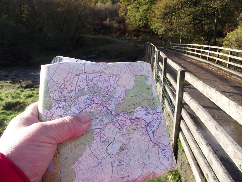 Orienting the map to fit the terrain  © From Hill Walking, published by Mountain Training UK