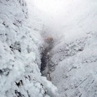 Full-on Scottish conditions. Spindrift on Winter Chimney (V,5), Ben Nevis