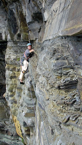 James McHaffie seconding on the 'suspect' rock of Cilan Head. Terrorhawk, E6.  © Jack Geldard
