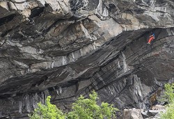 Adam Ondra checking out the crux on what became 120 degrees, 9a+, Flatanger, Norway  © Marie Couliou