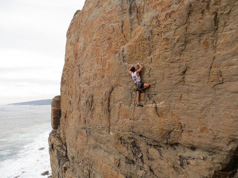 Mitch on his first trad lead- the super classic Stainless Steel (21) on Wilyabrup's Steel Wall.   © Jim Hulbert