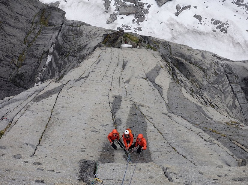 Team orange hanging out below the crux roof pitch  © Jacob Cook