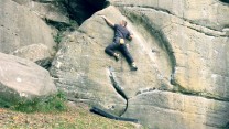 Paul Serby about to make the slap for the finishing sloper on Banana Hammock, Bowles Rock UK.