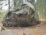 The 'Hate Rock' boulder. The routes from 'Cramps' run from back left up to the overhang. 'Raven' is just right of the overhang.