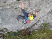 Reaching through the overhang, on Overdose at Pot Scar