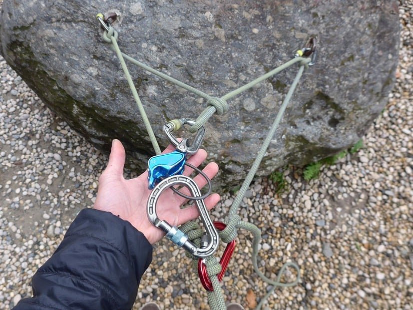 Belay device clipped to overhand knot  © Jack Geldard