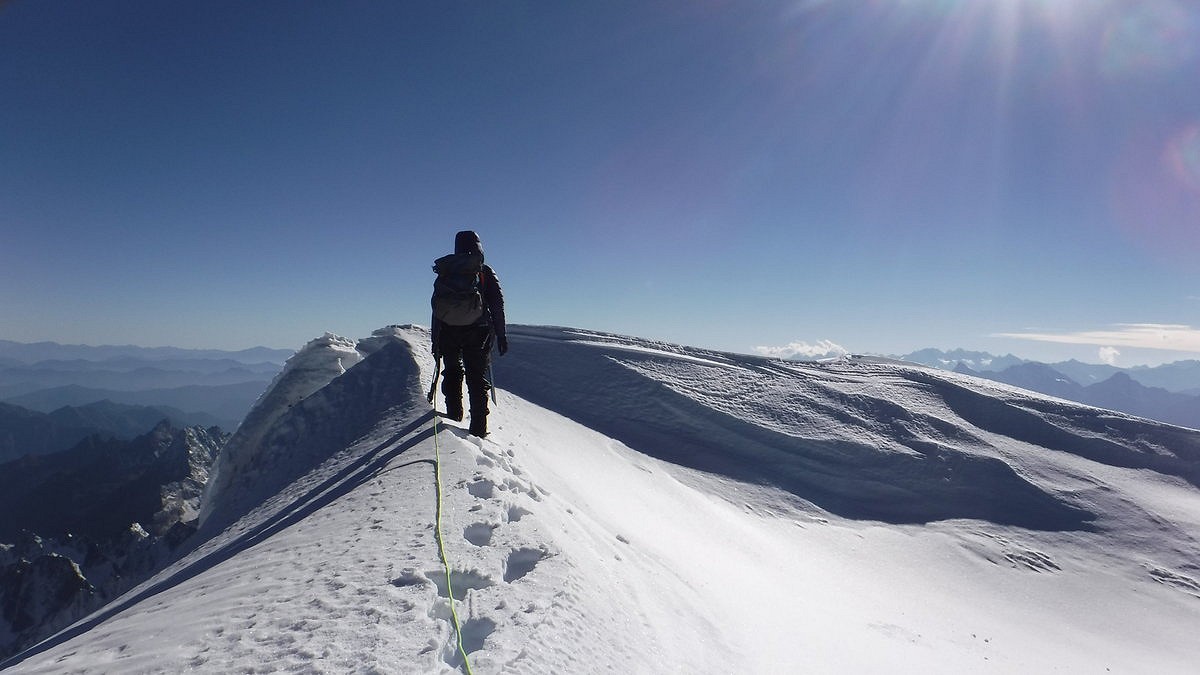 Becky summitting Peak 6246m  © Becky Coles