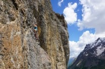 The first 6b on Roche Noire, stunning back drop of the Ecrins