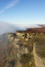 "Stanage Edge enveloped by cloud"

Like rolling horses they creep and canter as the white darkness encroaches over