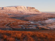 Sunset view of Pen-y-Ghent in the Yorkshire Dales from Whitber Hill.