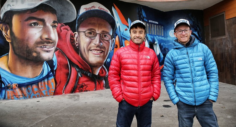 The Pou brothers visit a mural of their faces in Vitoria-Gasteiz in northern Spain  © J.Canyi - Filmut.com