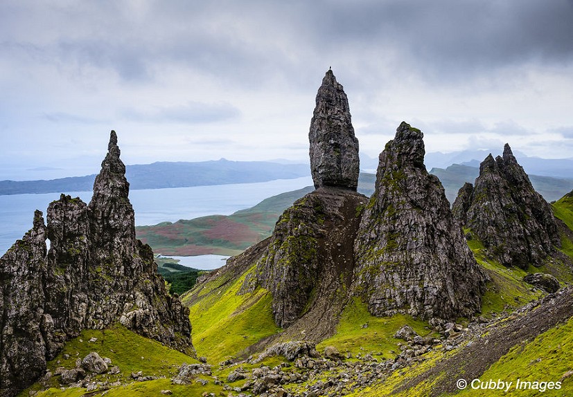 A relaxed Dave Macleod victorious after completing an archetypel Fowler chop route. The Old Man of Storr on the Isle of Skye.   © Dave Cuthbertson