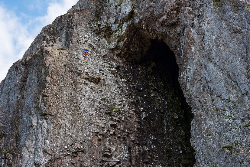 Iain Small on the left wall of Ossians Cave in Glencoe - the first ascent of The Return of Fionn mac Cumhaill, E6 6b.  © Dave Cuthbertson