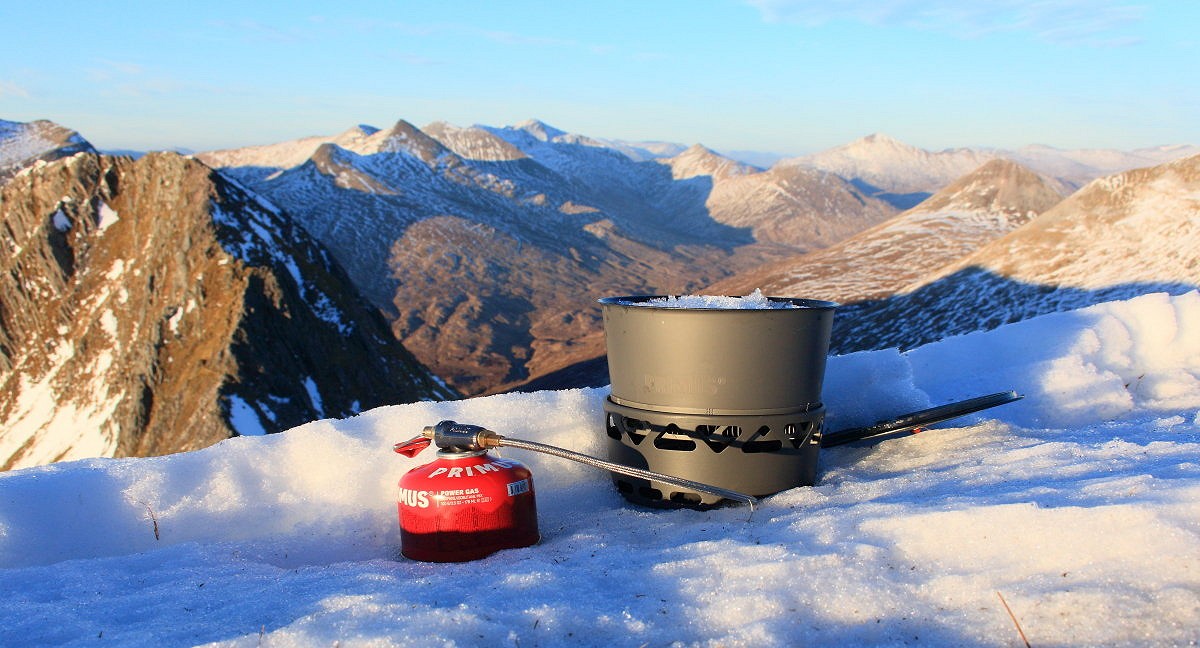 Melting snow for a brew with the Prime Tech stove and heat exchanger pot  © Dan Bailey