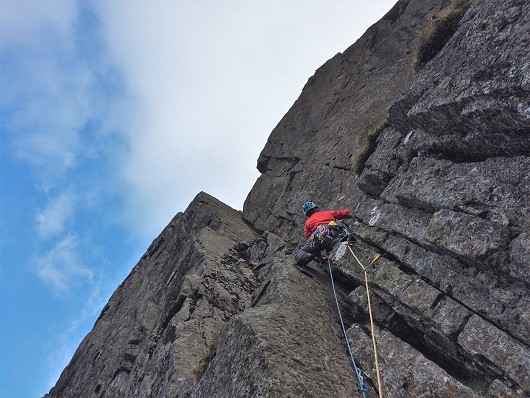 Matt starting out on the first pitch of an early season ascent of Botterill's Slab  © Samuel Wainwright