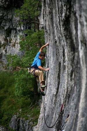 Author on Free and Easy 7c at Malham. A traversing route, possibly easier to catch a foot and invert?  © Dave Pickford