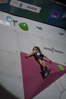 Janja Garnbret near the top on the final route at the Villars World Cup 2017  © Björn Pohl