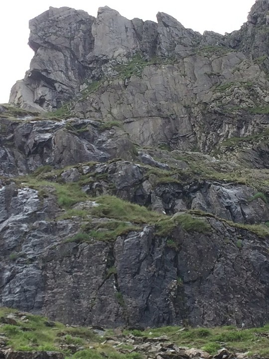 The Cwm Face runs up the pale blank tower centre-left at the top of this image  © Alex Mason