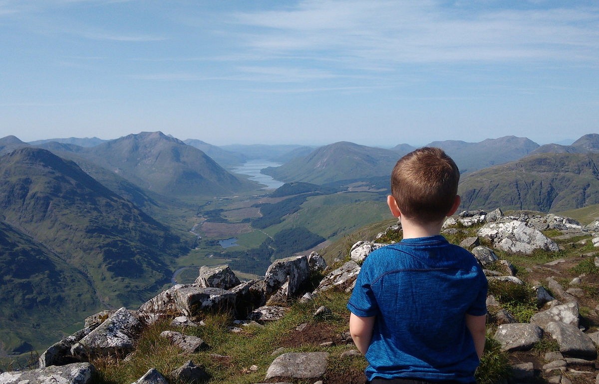 Finn looks over Glen Etive - a view that's hard earned on little legs  © Wilcox family