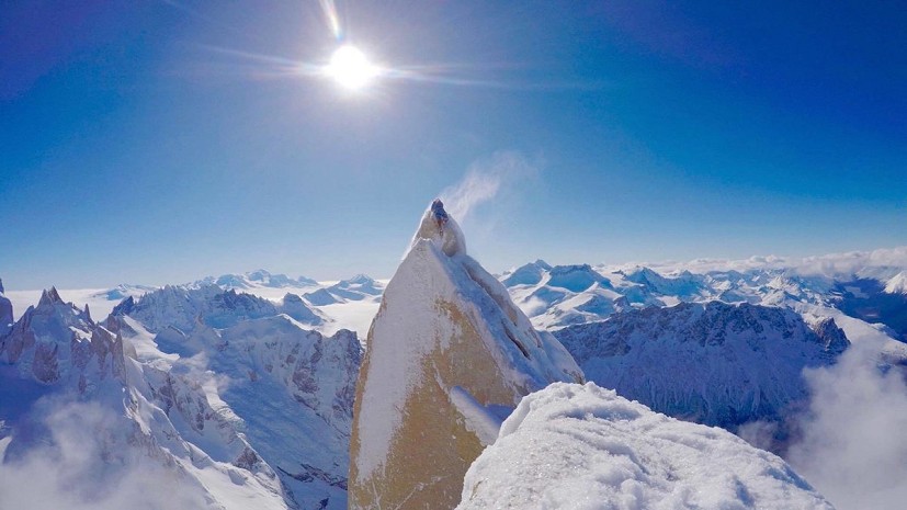 Markus climbs onto the summit  © Markus Pucher