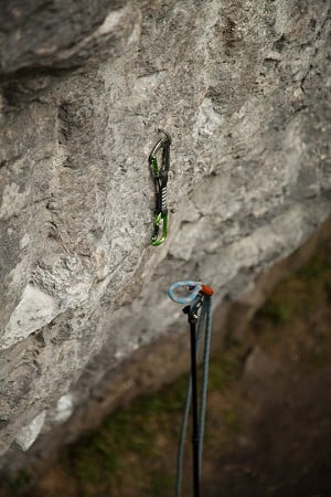 Climber 700 clipping a rope to a quickdraw - 1  © Rob Greenwood - UKC