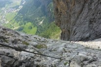 Mid pitch on the ferrata, before the final steep section. Colfosco in the background.
