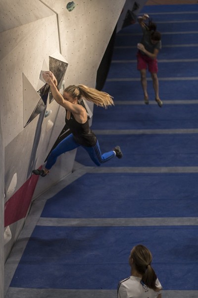 Shauna Coxsey working one of the problems at the Legends Only practice session  © Björn Pohl