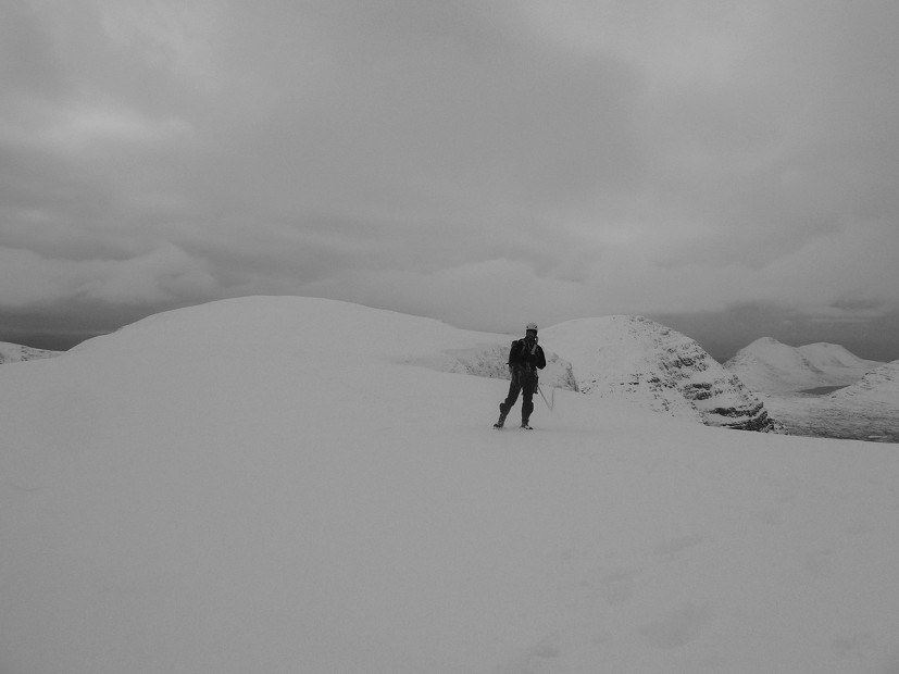 Uisdean on the summit plateau of Beinn Eighe - not a place to be lost in a whiteout!  © Tom Livingstone
