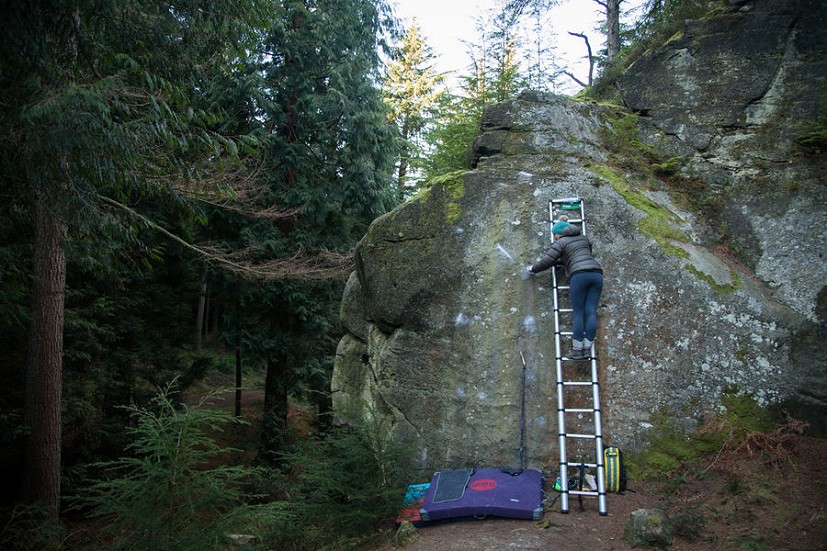 Penny Orr inspecting + brushing the holds on The Nadser, Kyloe in the Woods  © Rob Greenwood - UKC
