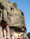 Mark Riley climbing Flake Wall E5 6a at Helsby