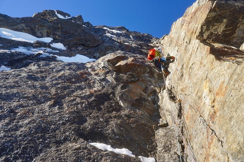 Tom climbing Navigator Wall with bare hands and crampons.  © Tom Livingstone