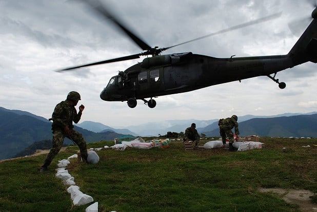 Helicopter landing in Colombia. The remote Andes nurtured a half-century civil war.  © Russ Finkelstein @russfinkelstein