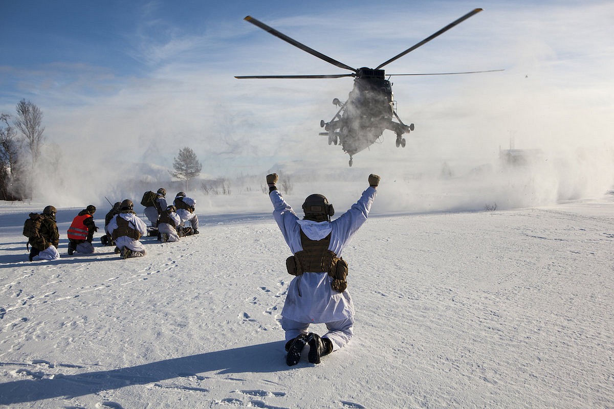 A helicopter lands in a NATO Arctic exercise.  © Robert Nickelsberg