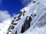 Ice climbing in sunshine in Scotland