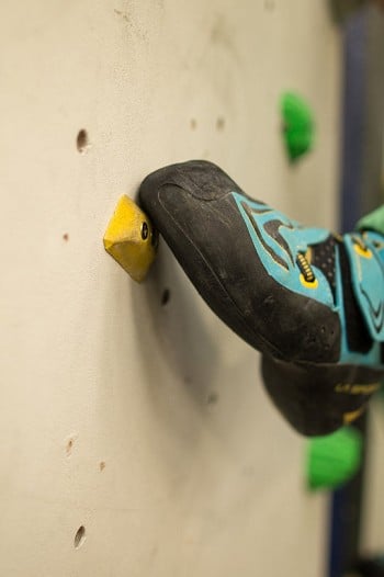 You can forget using tiny, sloping screw-on footholds unless you wear tight-fitting performance shoes.  © Nick Brown - UKC