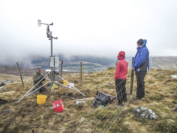 The new weather station being set up  © National Trust for Scotland