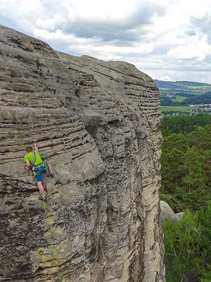 Radim, Ocun's rope designer, showing the way up the Dragon's Tooth tower  © Theo Moore - UKC