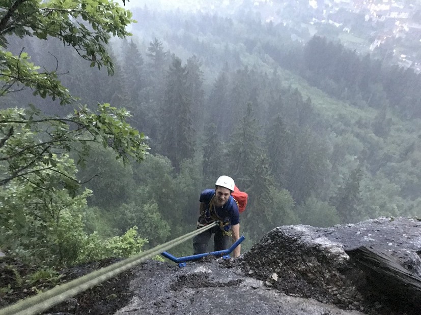 A well equipped abseil station comes in handy when a summer storm hits...  © Paul Sagar
