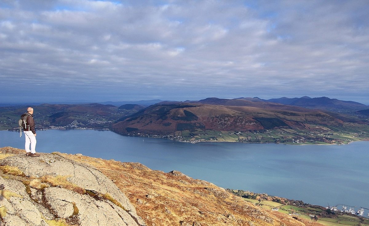 The stunning view across Carlingford Lough toward the Rostrevor Hills and Mourne Mountains from high on Slieve Foye  © Adrian Hendroff