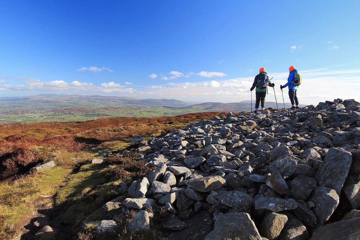 Looking eastward toward the Mourne Mountains and Cooley Peninsula from Slieve Gullion's North Cairn  © Adrian Hendroff