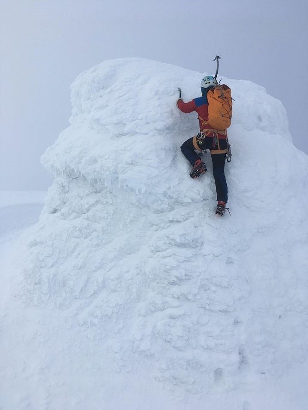 Tom on the summit mushroom of Cerro Torre, or is it the Ben Nevis summit shelter?   © Becky Coles