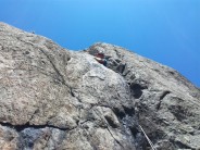 Erik Button getting acquainted with the off-width on pitch 3 of Spectre